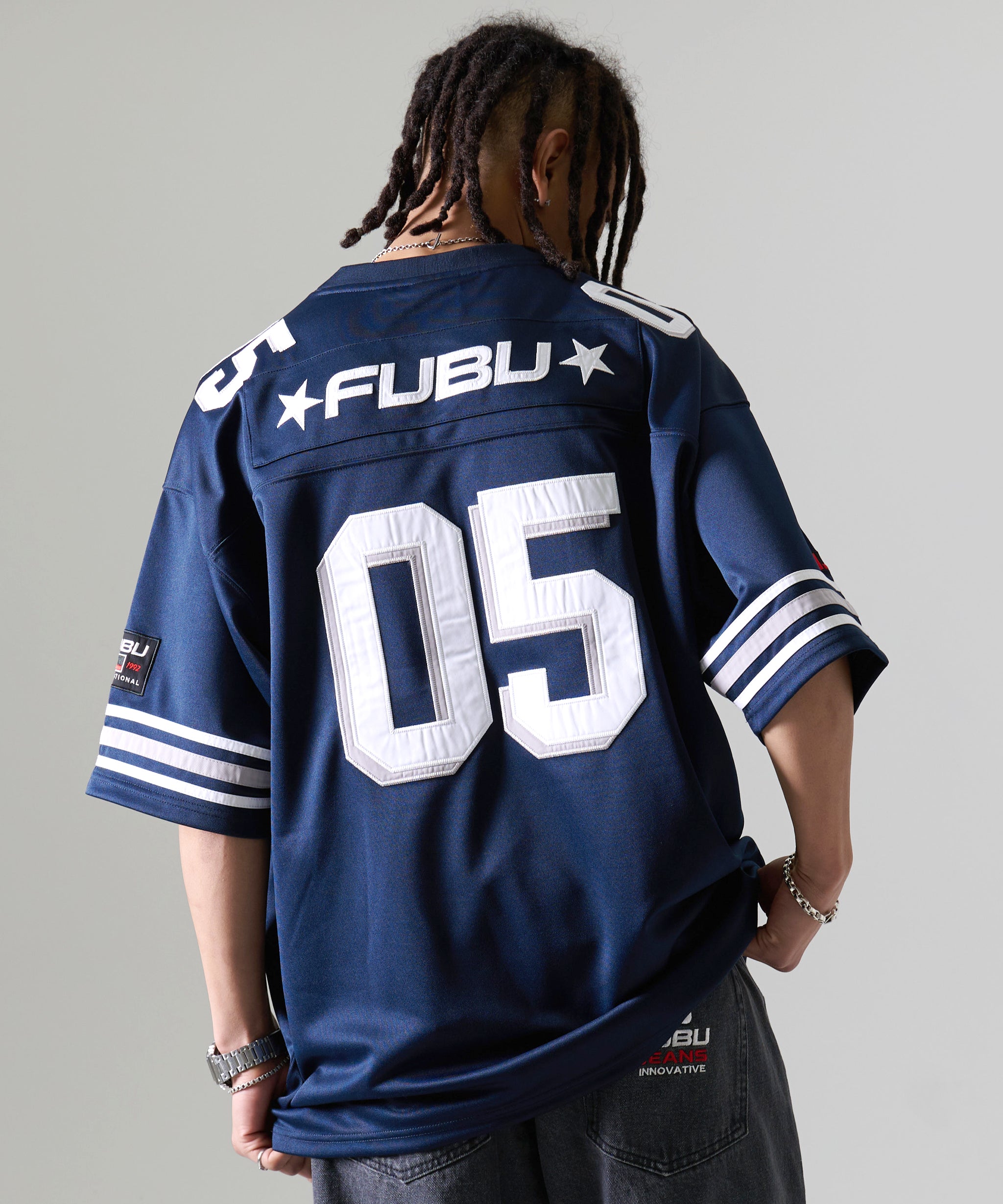 FUBU フブ トップス ブランド ロゴ フットボール ゲームシャツ。FUBUは