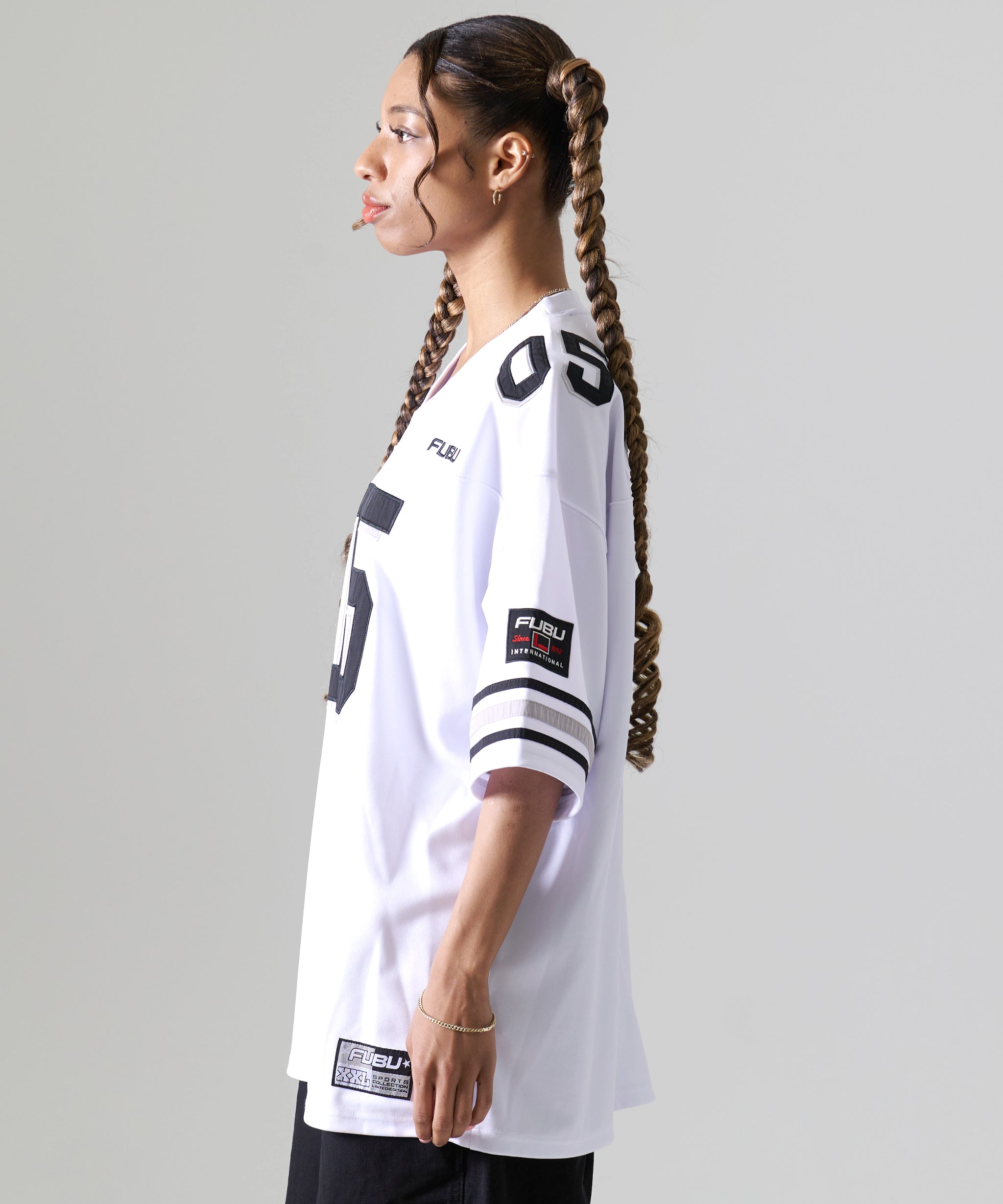 FUBU フブ トップス ブランド ロゴ フットボール ゲームシャツ。FUBUは