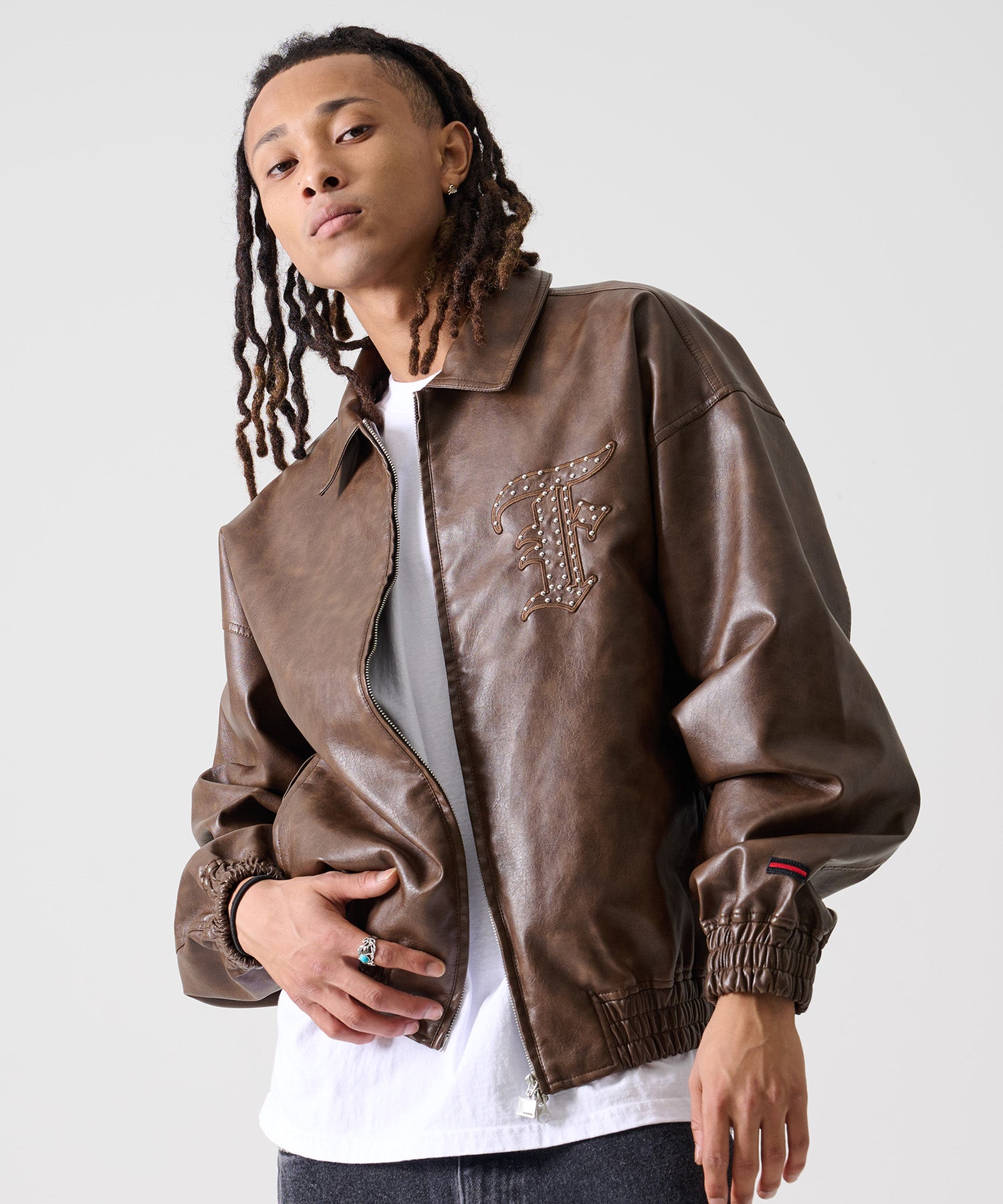 FUBU フブ スタンドパッチ レザー ジャケット。FUBUはアメリカの代表的