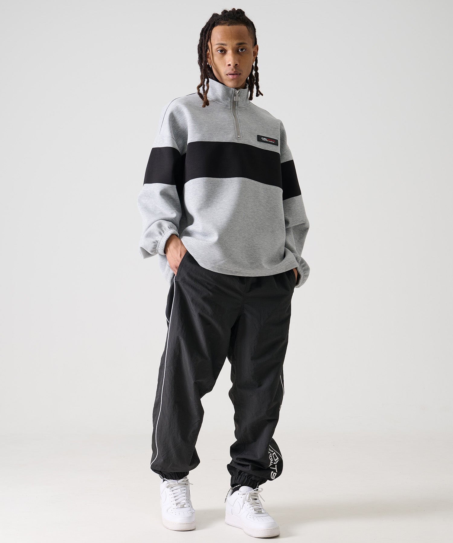 FUBU フブ テック ハーフ ジップ トレーナー 。FUBUはアメリカの代表的